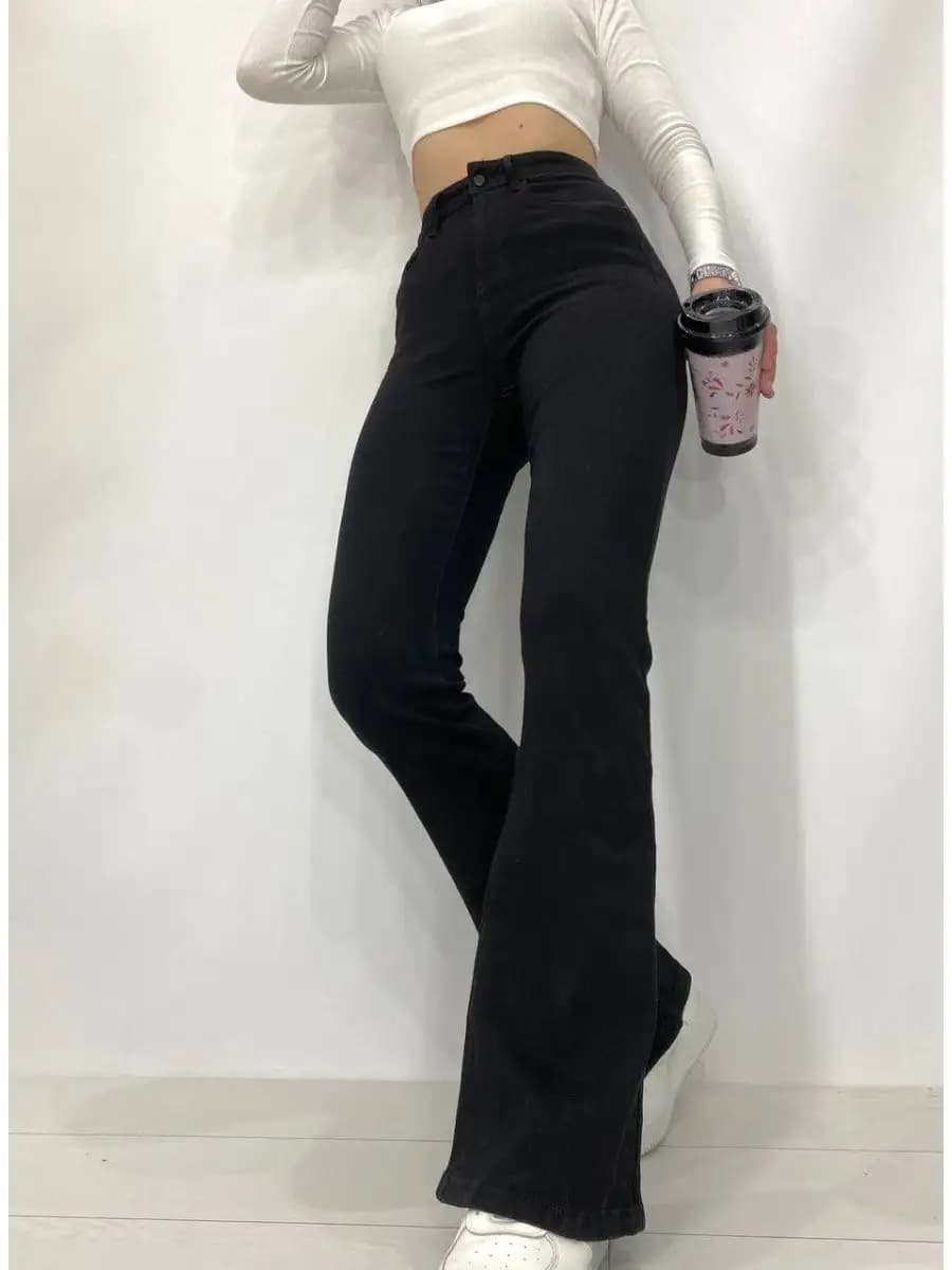 Джинсы клеш от колена с высокой посадкой