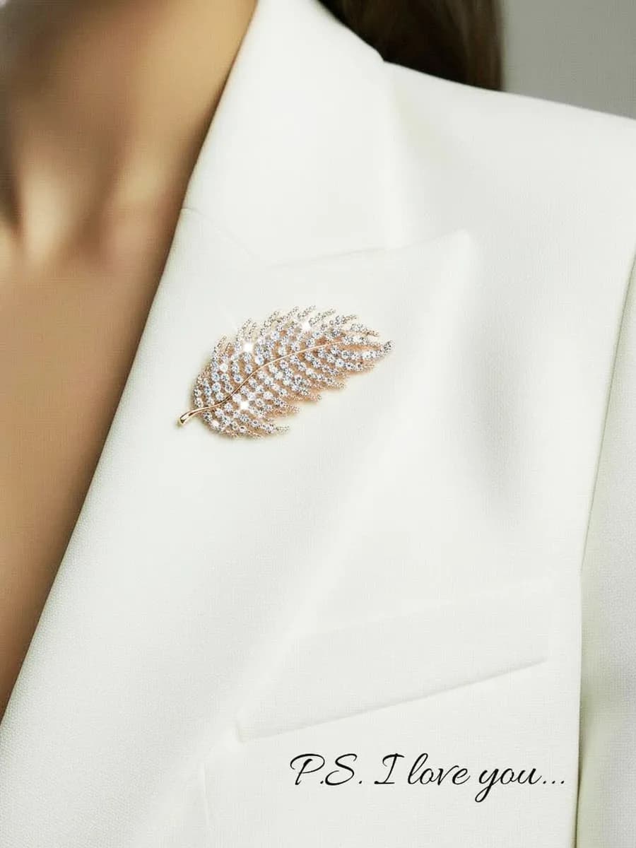 Брошь булавка "Перо" со стразами бижутерия