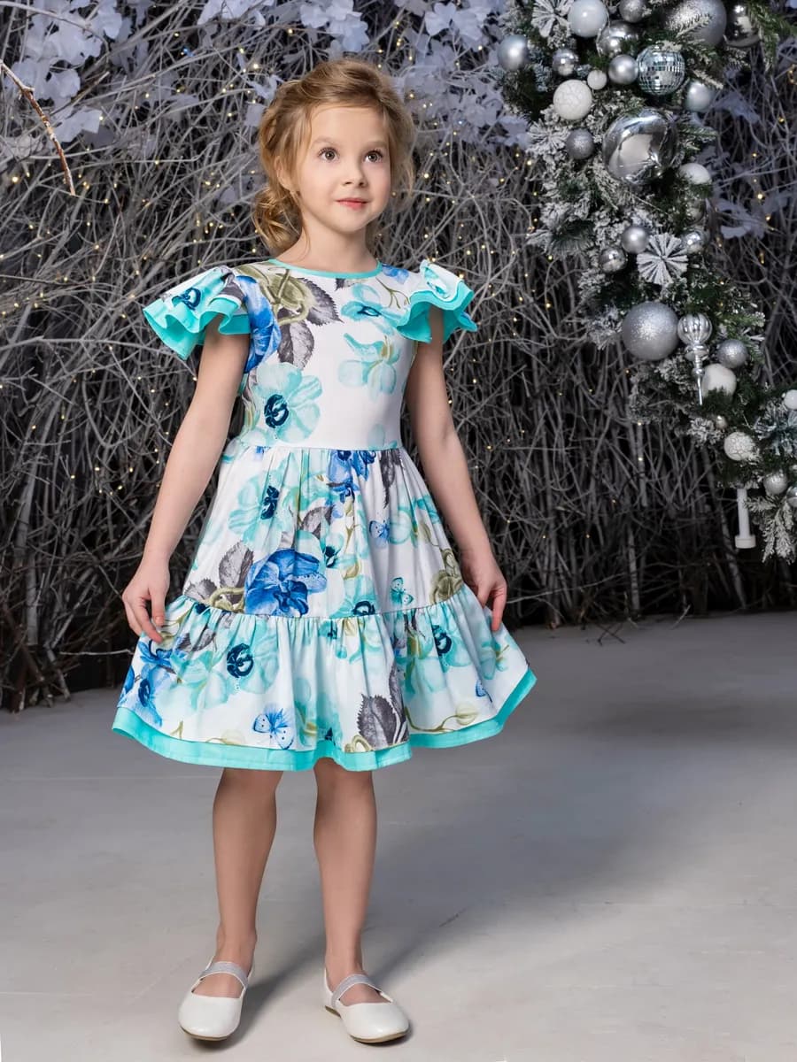 Нарядное платье с пышной юбкой с воланами