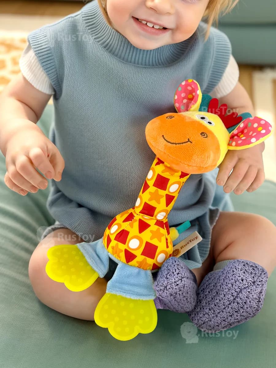 Развивающая игрушка - погремушка для новорожденных