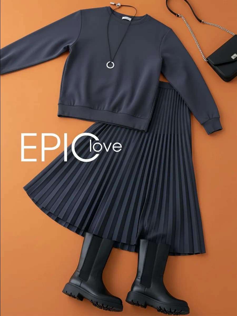 Костюм с юбкой плиссе трикотажный