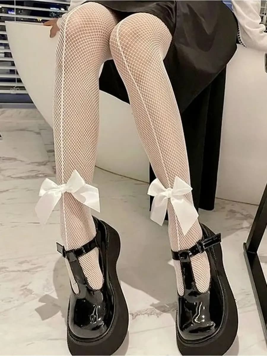 Колготки в сетку с бантом белые