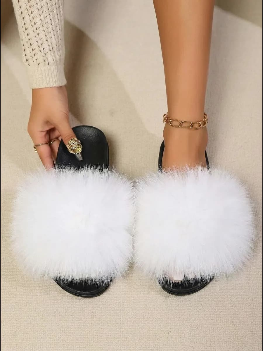 Тапочки с натуральным мехом на уличной подошве