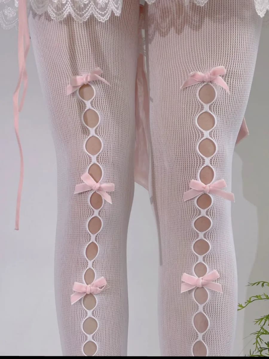 Колготки в сетку с бантиками