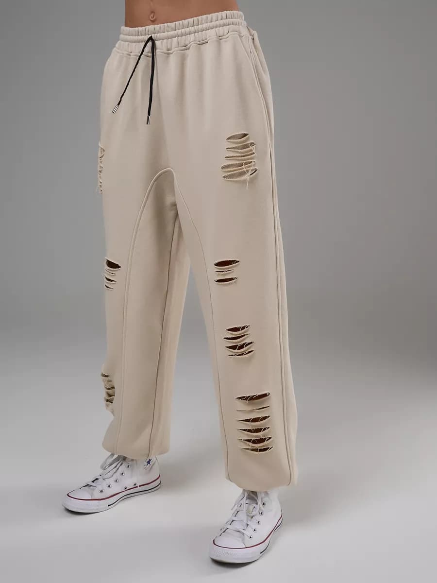 Спортивные штаны джоггеры рваные