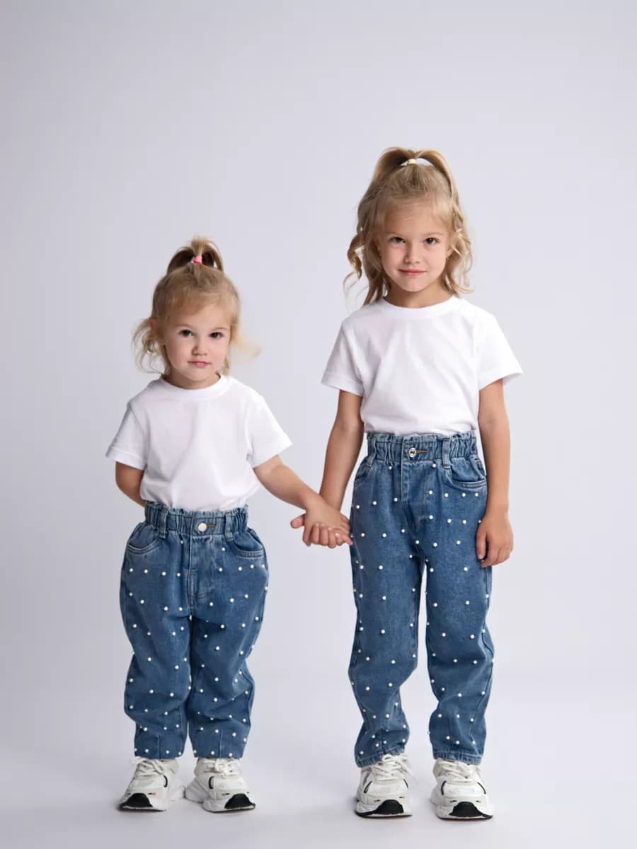 Джинсы с жемчугом нарядные бананы