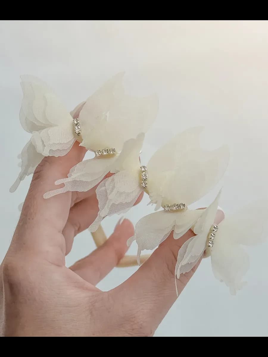 Повязка для новорожденных с молочными бабочками