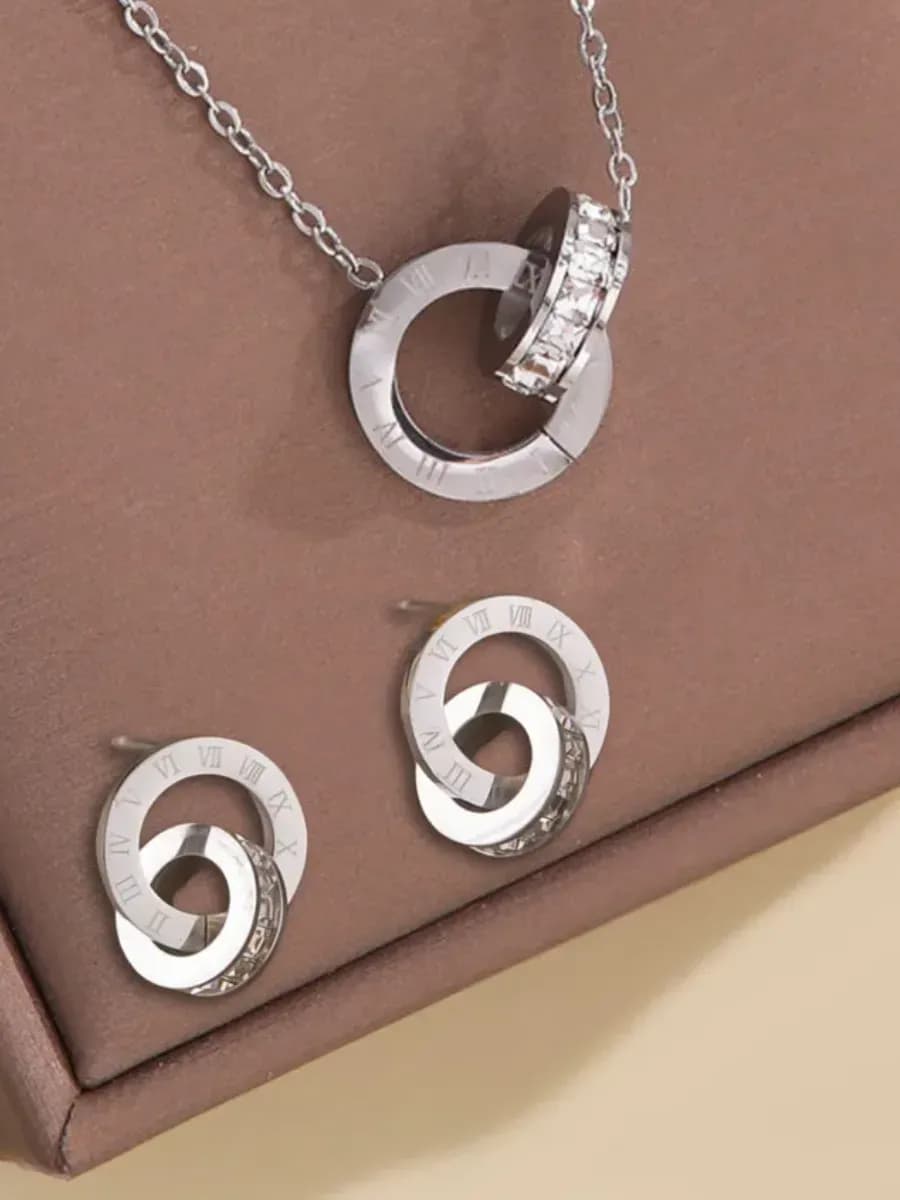 Комплект бижутерии на шею с сережками