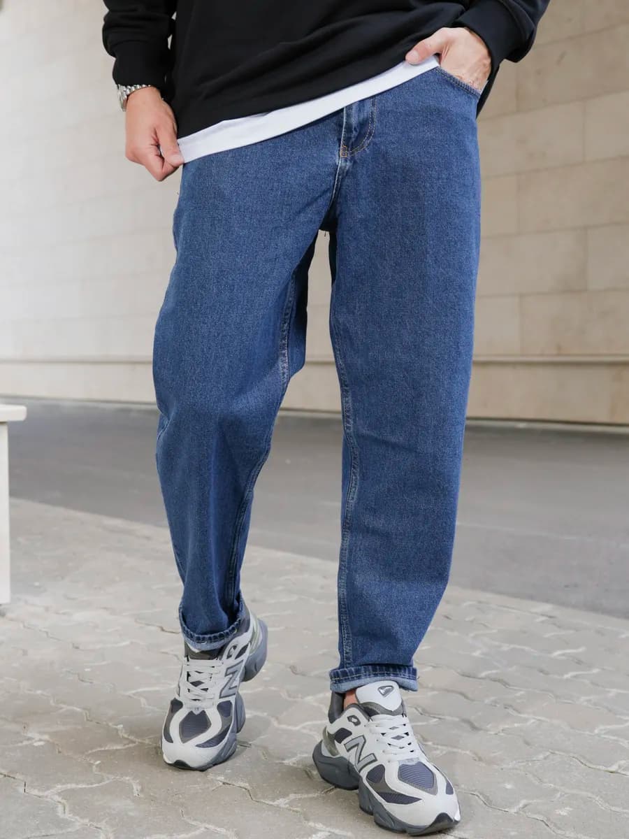 Джинсы бананы зауженные к низу mom