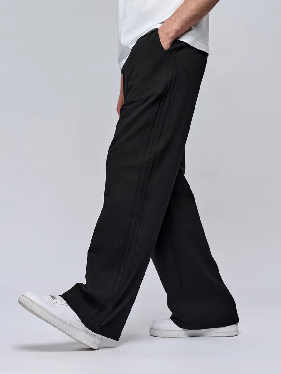 Спортивные широкие штаны с отделкой