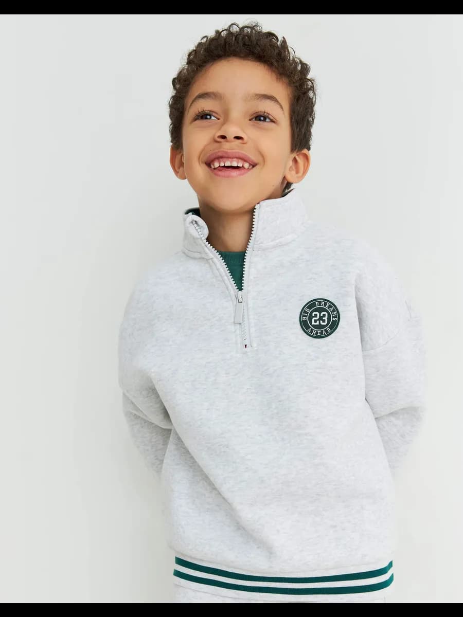 Серый свитшот oversize с воротником-стойкой и начёсом