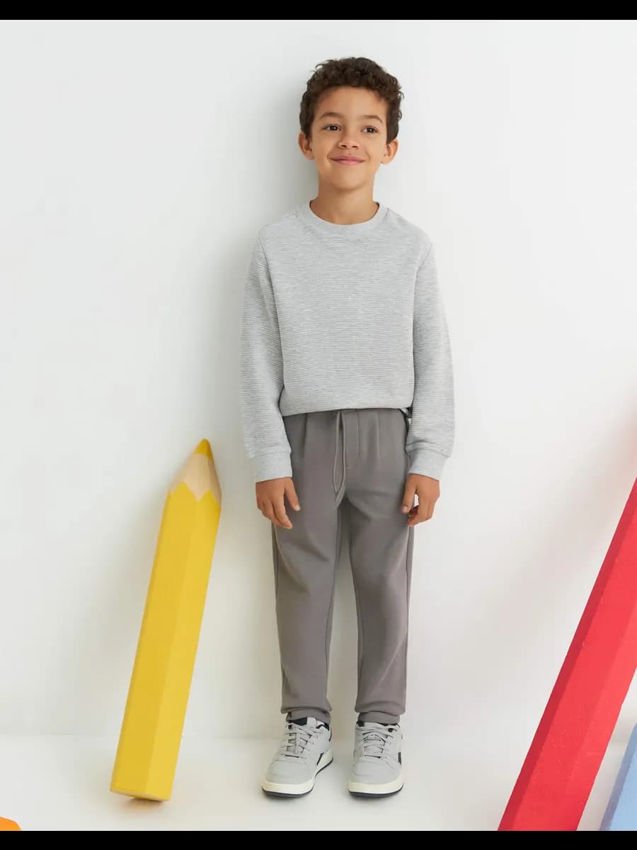 Серые брюки Tapered на резинке