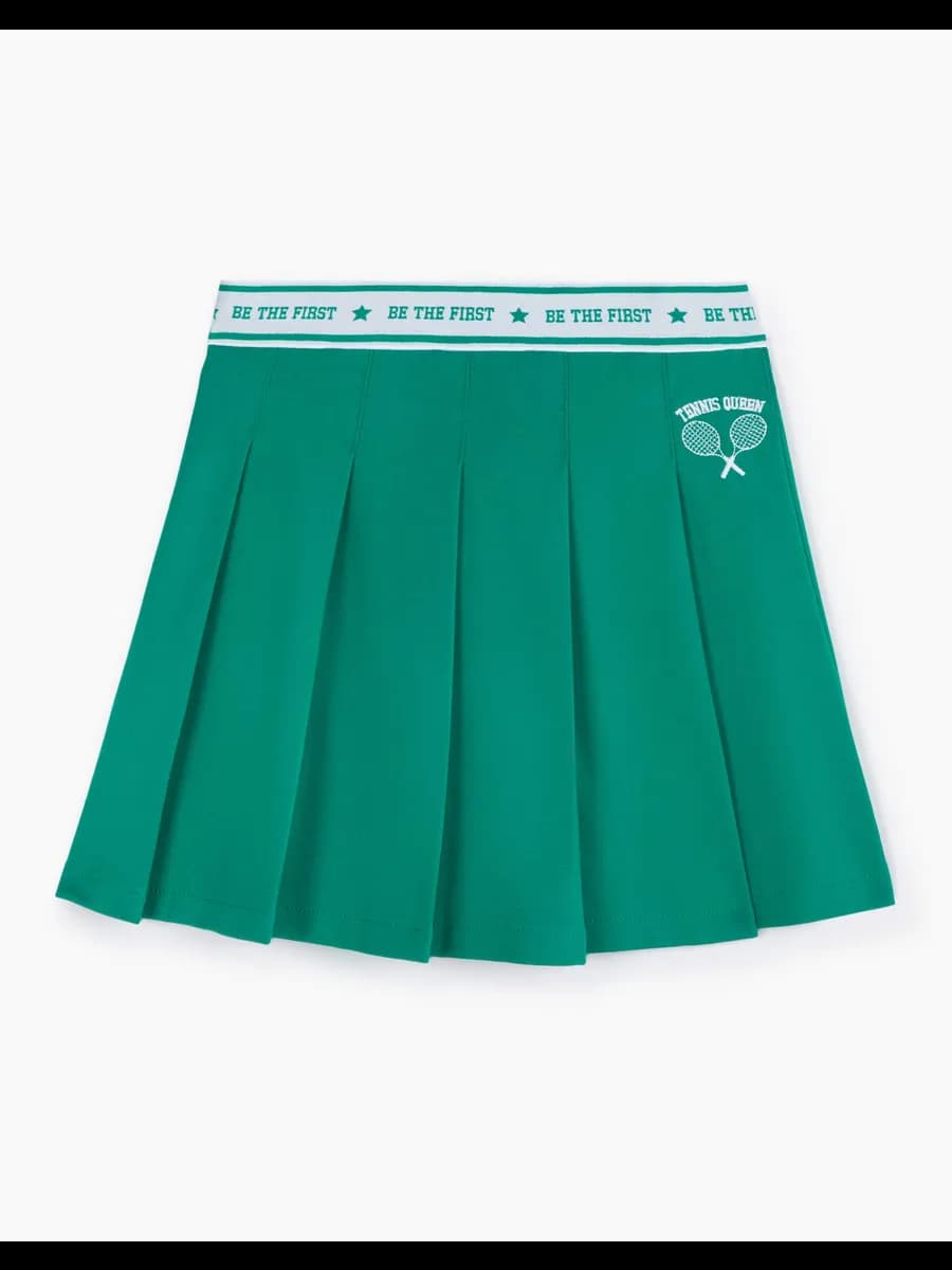 Зелёная юбка со складками и вышивкой