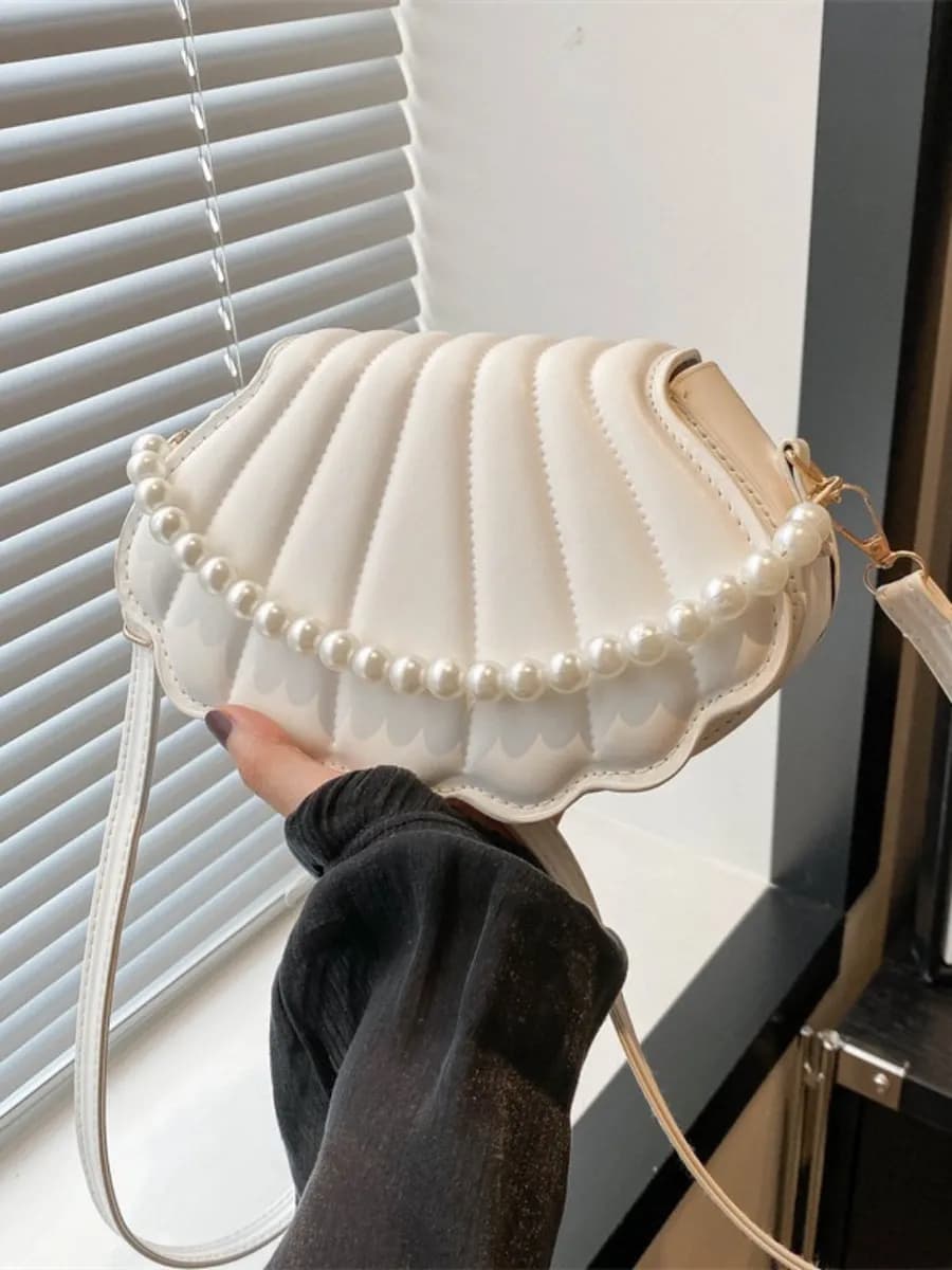 Сумка ракушка через плечо