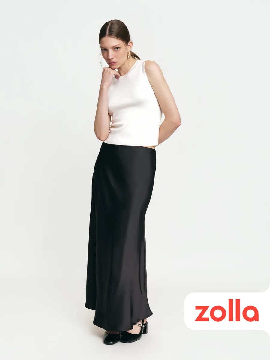 Женский вязаный топ без рукавов