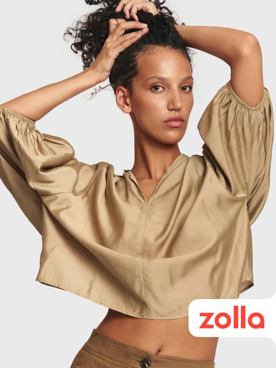 Женская однотонная блузка с вырезом - фото 1