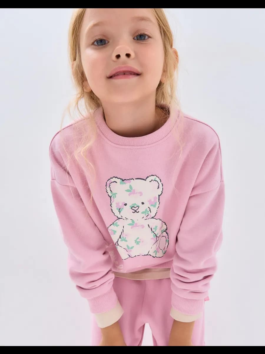 Розовый свитшот oversize с принтом и начёсом