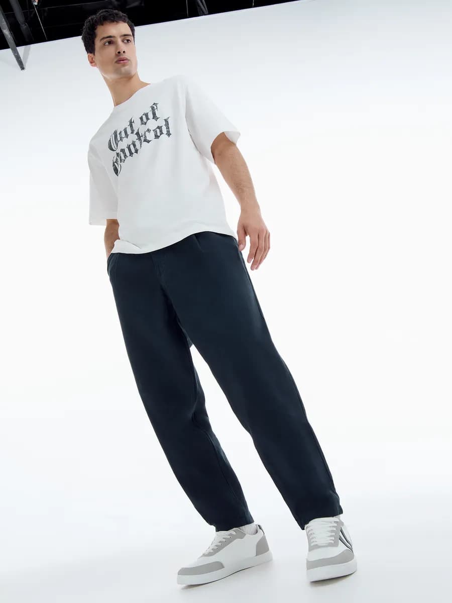 Зауженные широкие брюки