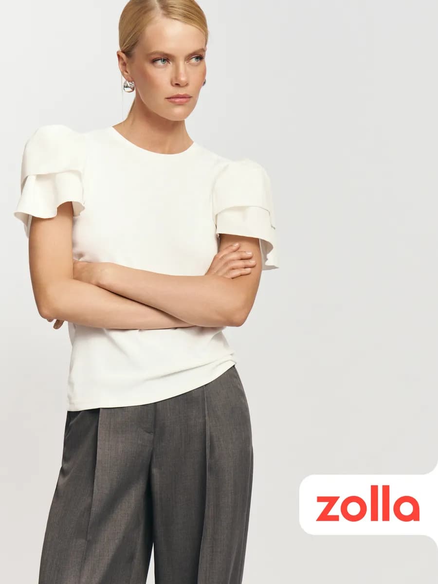 Женский топ-блузка с воланами