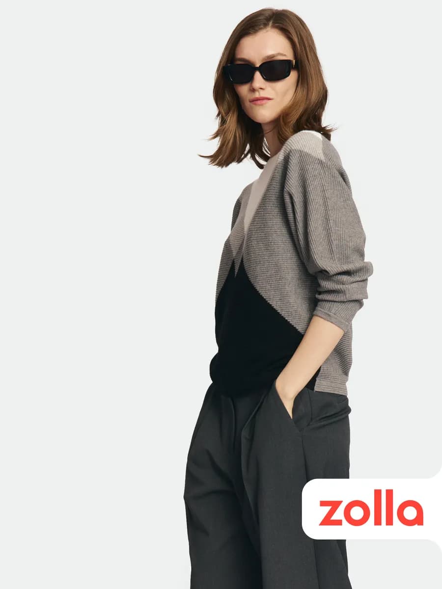 Женский трикотажный джемпер летучая мышь