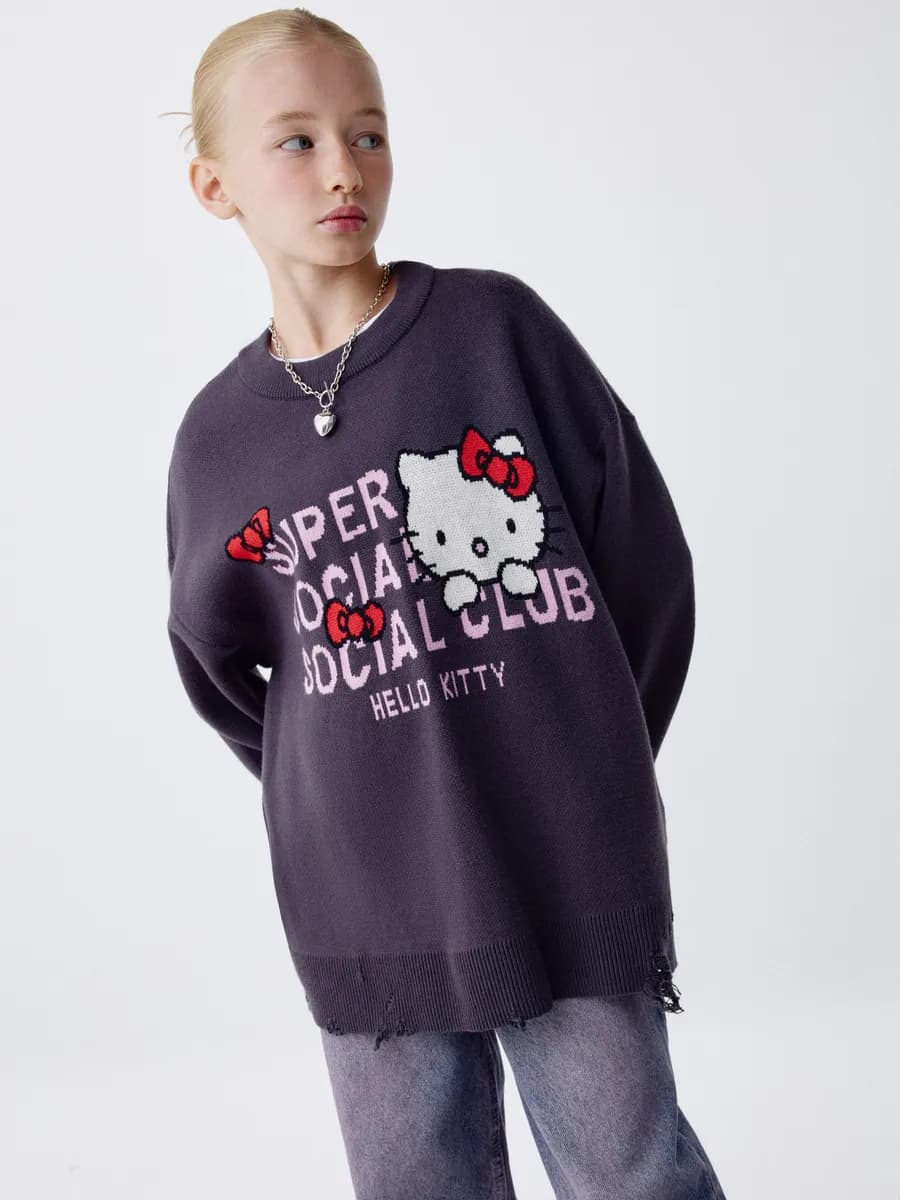 Вязаный джемпер оверсайз рваный с принтом