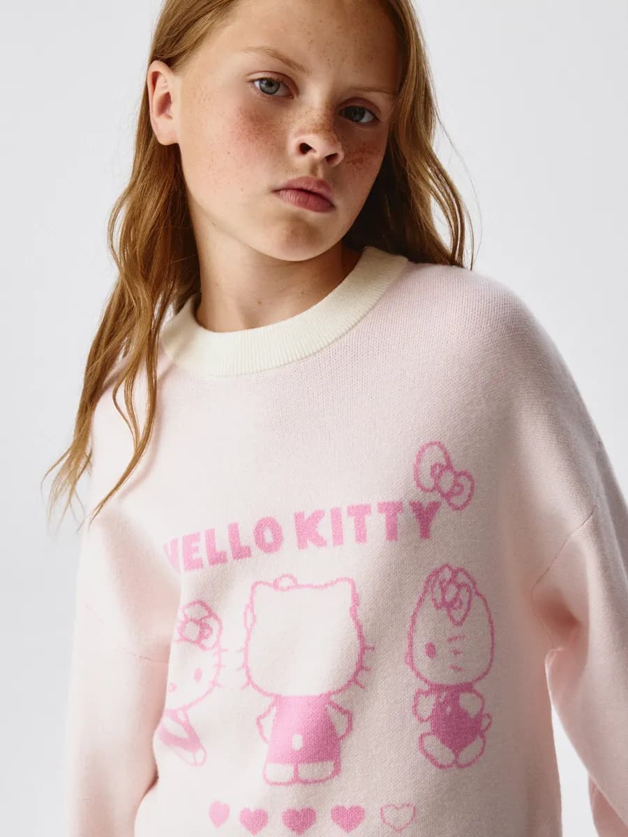 Вязаный джемпер оверсайз рваный с принтом