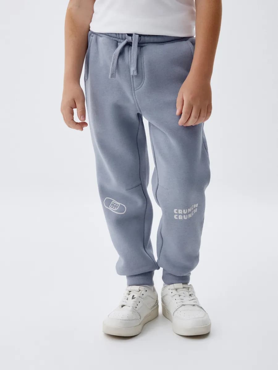 Джоггеры утепленные на резинке с принтом