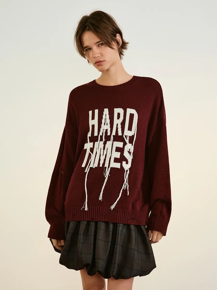 Джемпер вязаный рваный с надписью