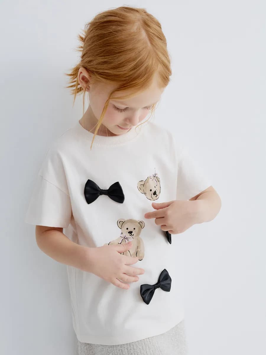 Футболка оверсайз хлопковая новогодняя с принтом и бантиками