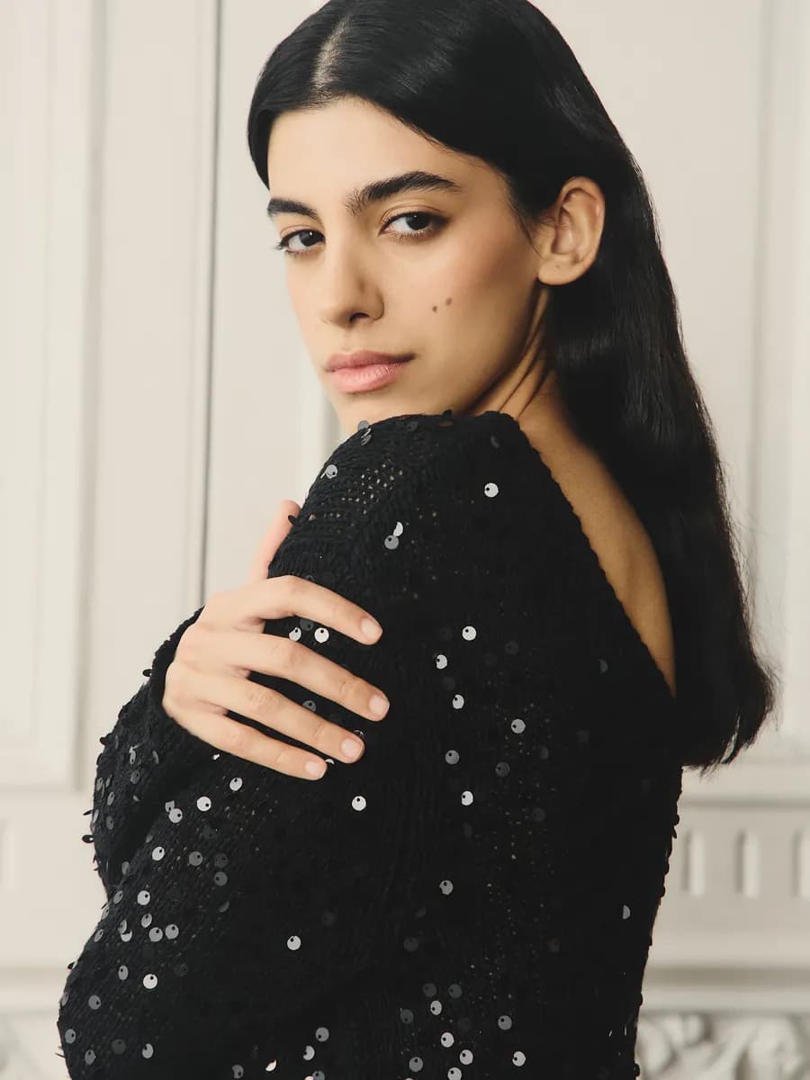 Джемпер с пайетками с открытой спиной нарядный