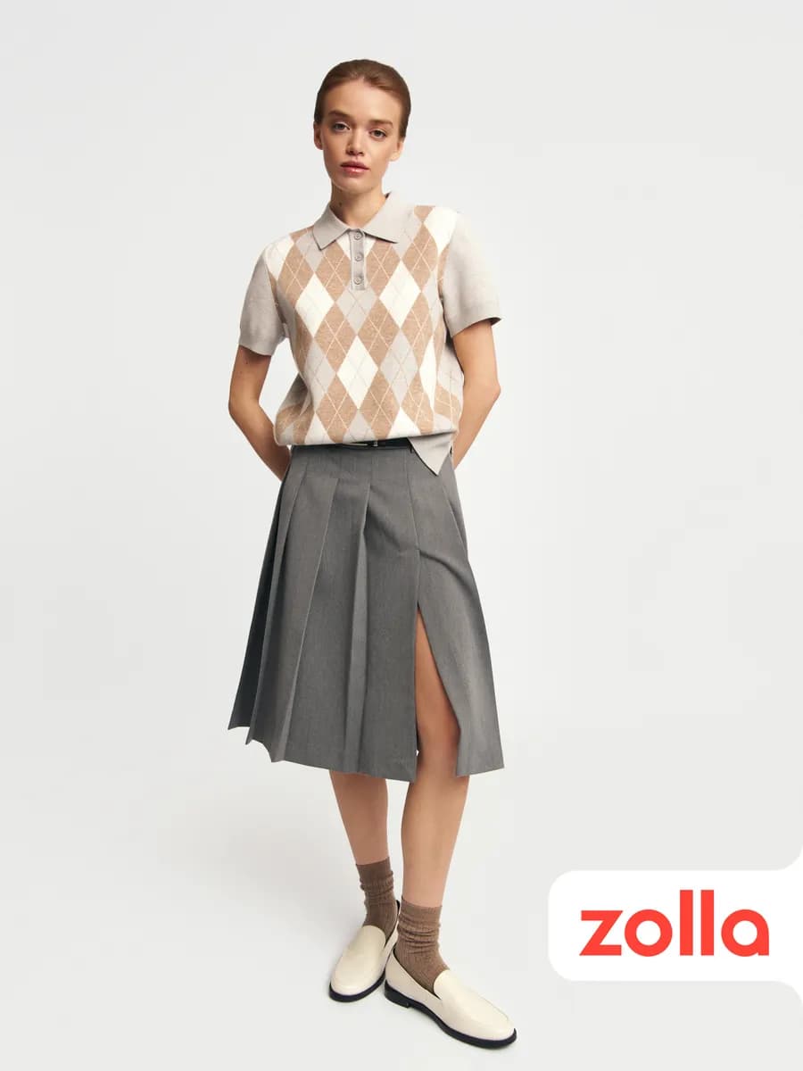 Женская юбка миди в складку