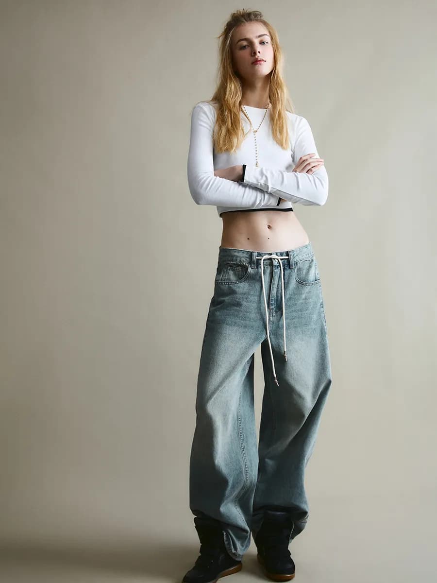 Джинсы baggy fit с декоративными швами и завязками