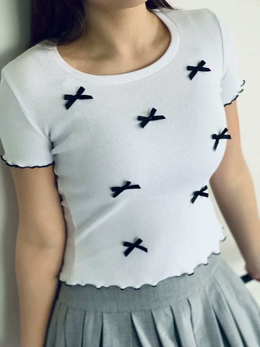 Блузка с бантиками