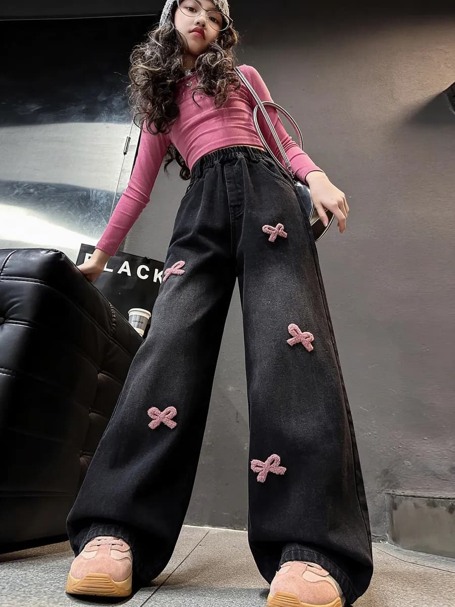 Джинсы с бантиками