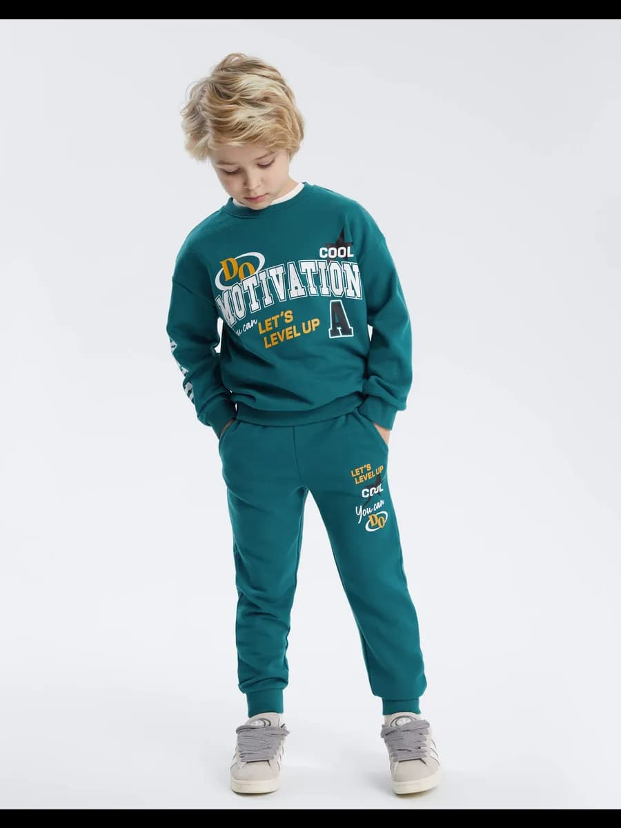 Зелёные спортивные брюки Comfort с принтом