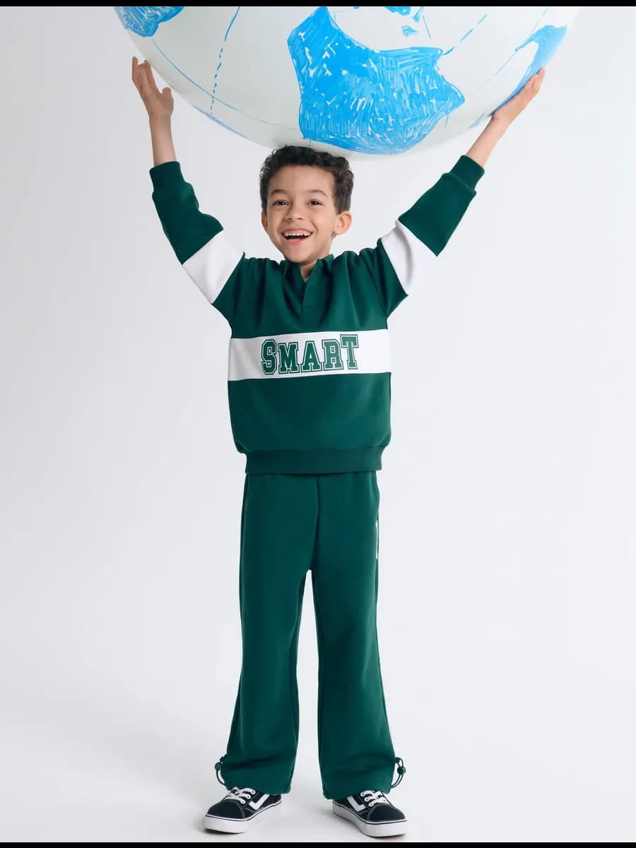 Тёмно-зелёные спортивные брюки-трансформеры oversize - фото 1