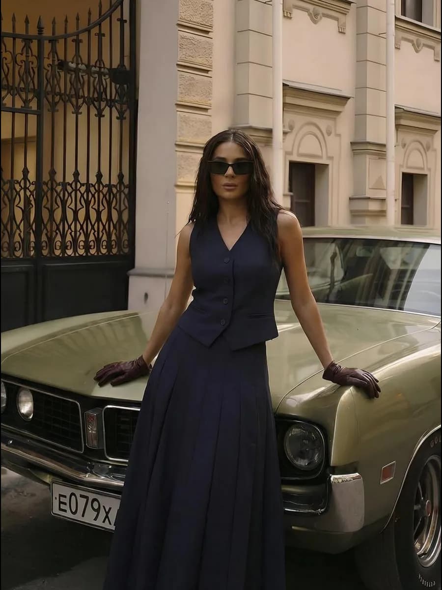 Костюм с юбкой плиссе