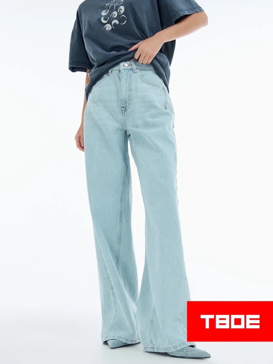 Широкие джинсы трубы с заниженной талией