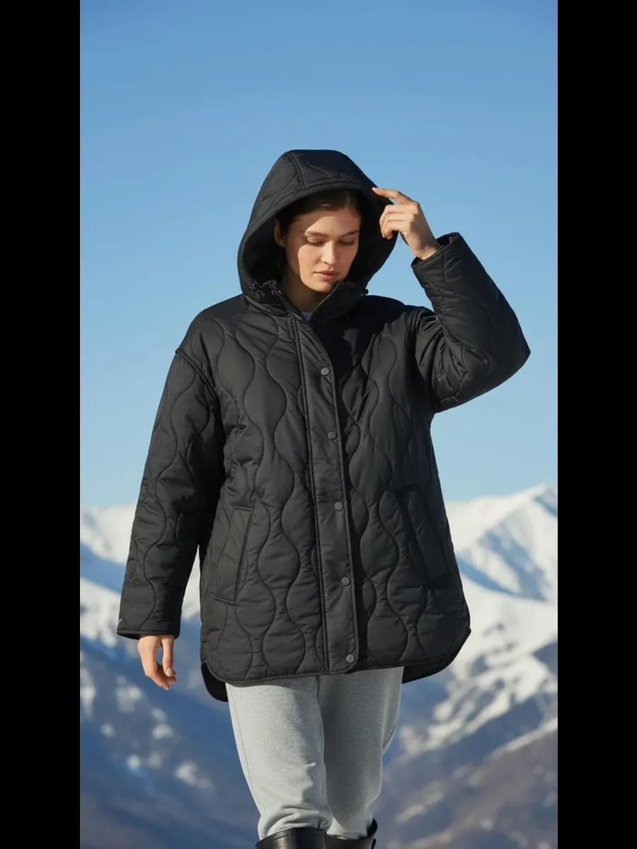 Утепленная стеганая куртка удлиненная