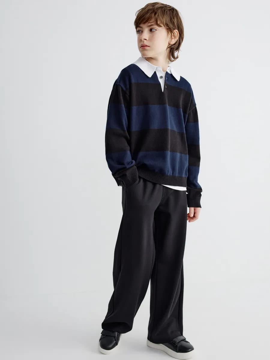 Свободные брюки черные трикотажные на резинке